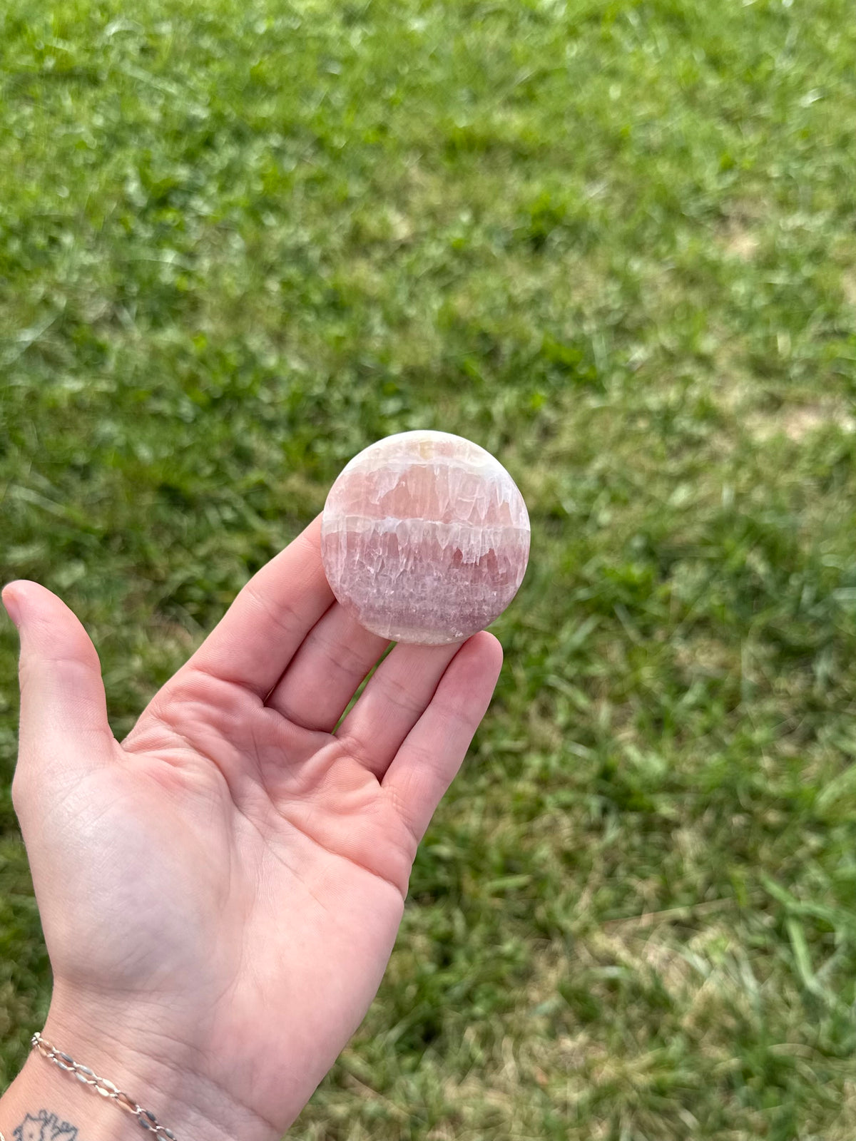 Large rose calcite round flats