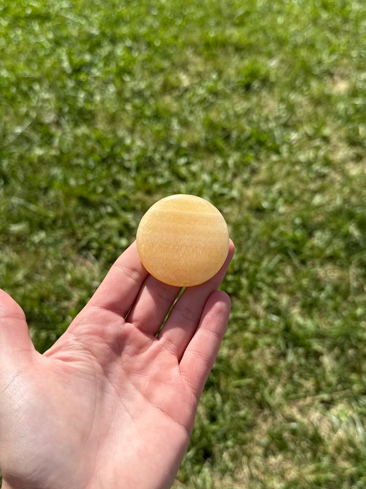 Large orange calcite round flats