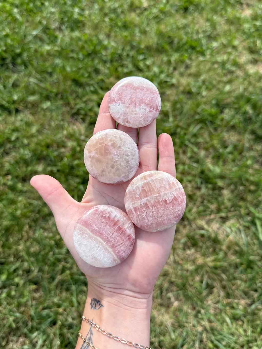 Large rose calcite round flats