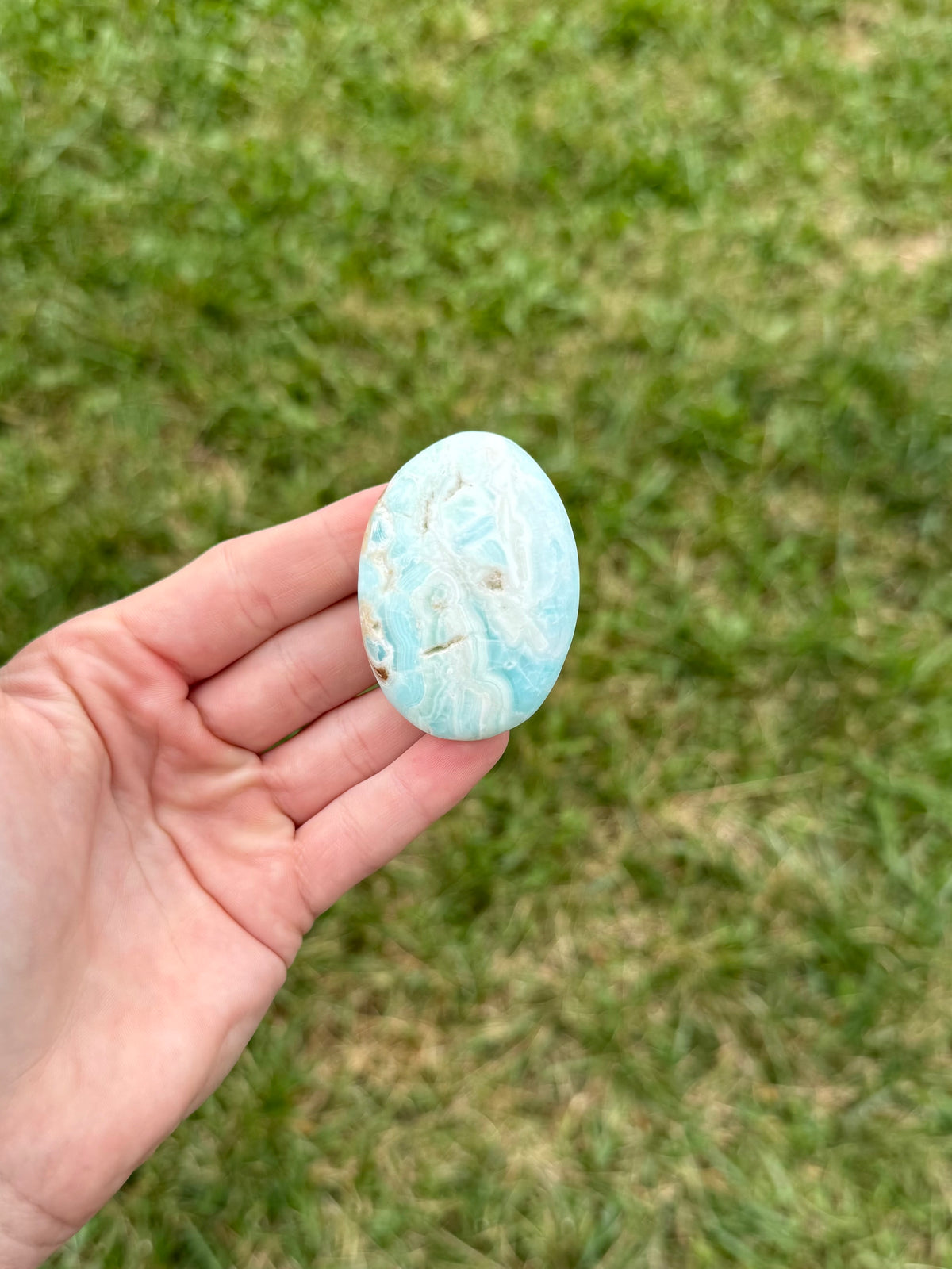 Medium blue aragonite palm stones