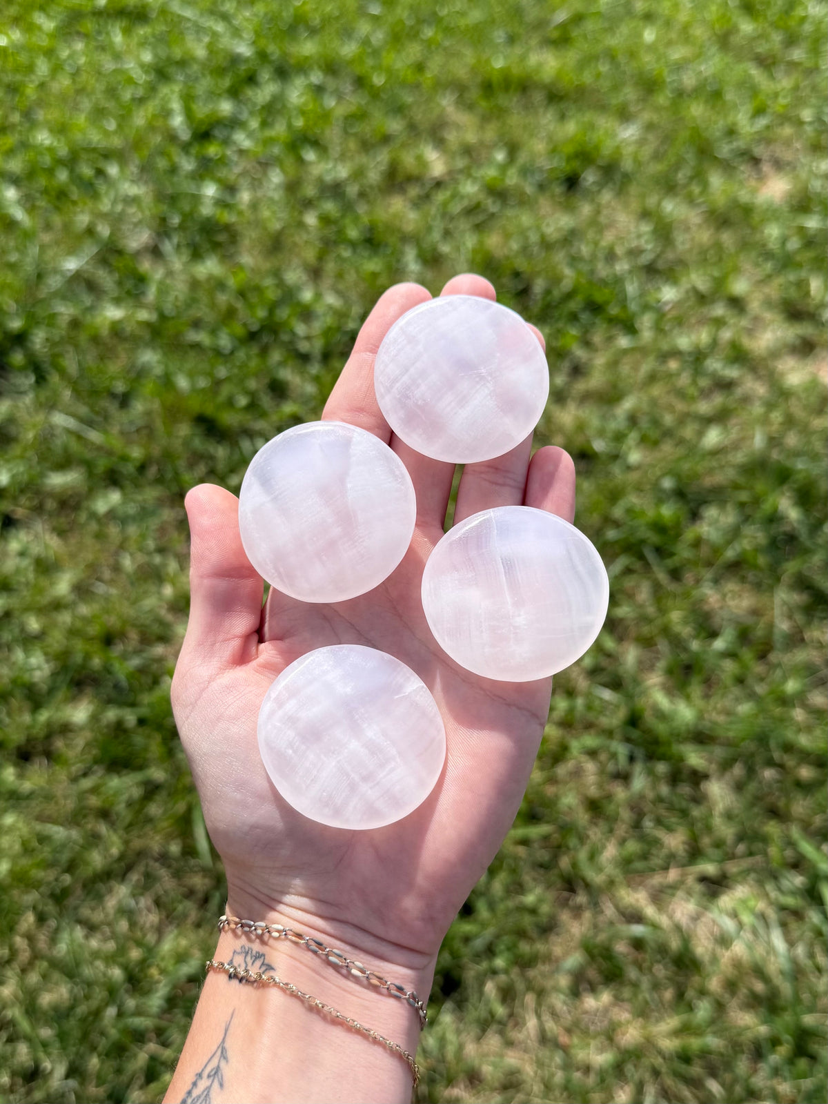 Large pink calcite round flats (uv reactive)