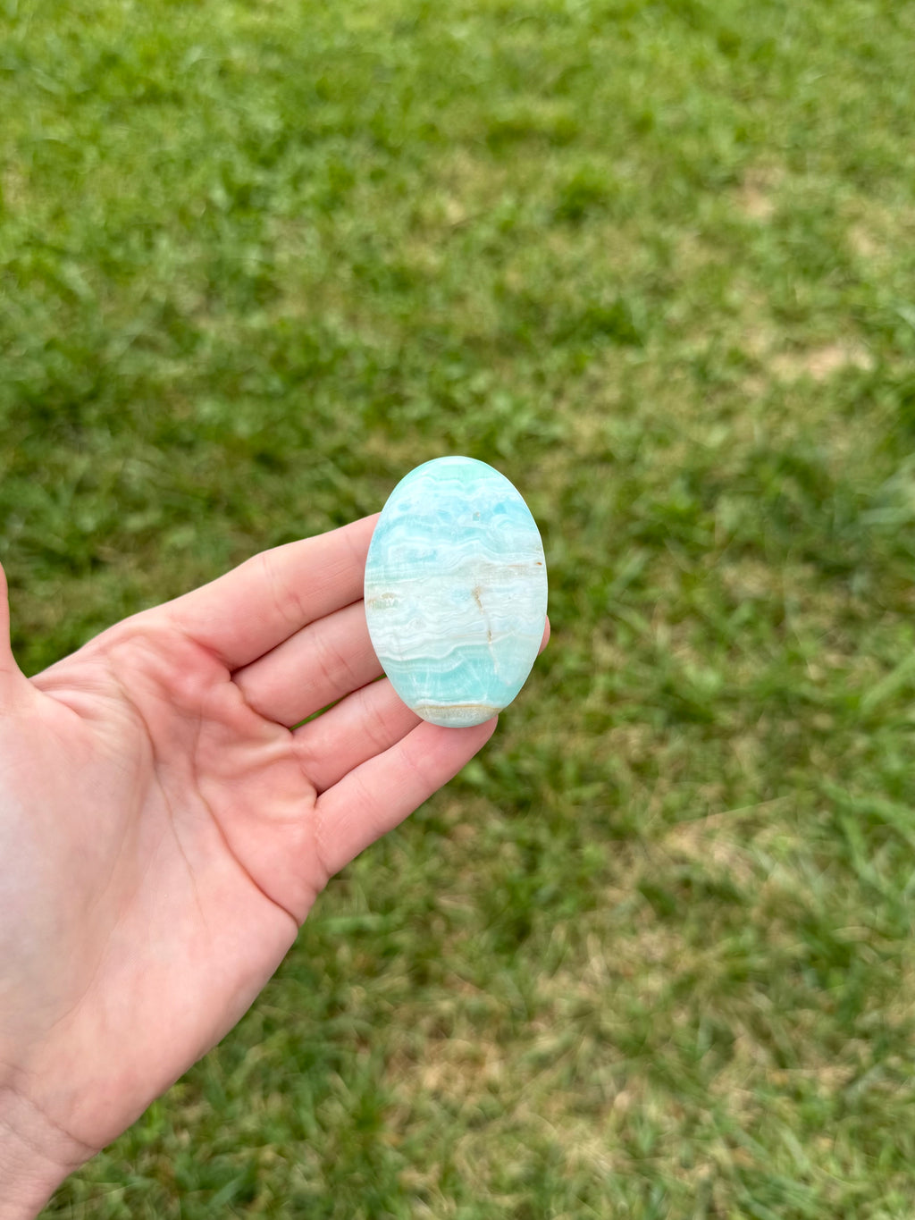 Medium blue aragonite palm stones