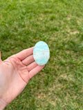 Medium blue aragonite palm stones