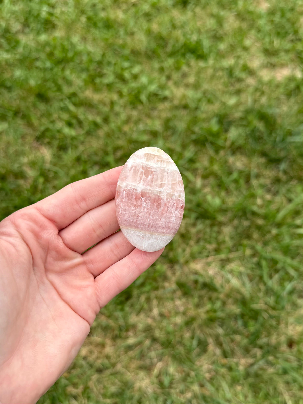 Medium rose calcite palm stones