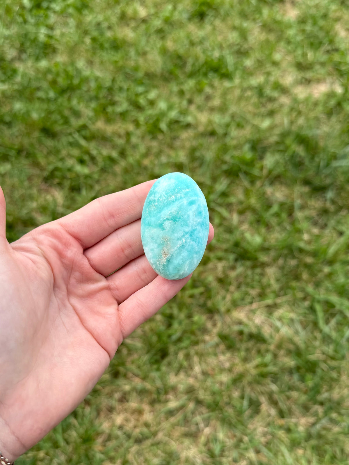 Small blue aragonite palm stones