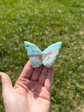 Blue aragonite butterflies