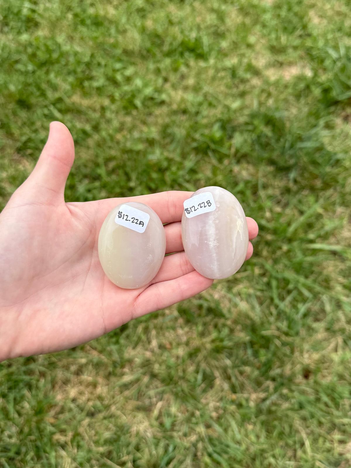 Medium pink banded onyx palm stones