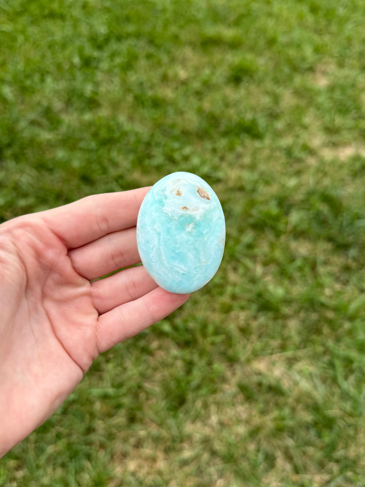 Medium blue aragonite palm stones