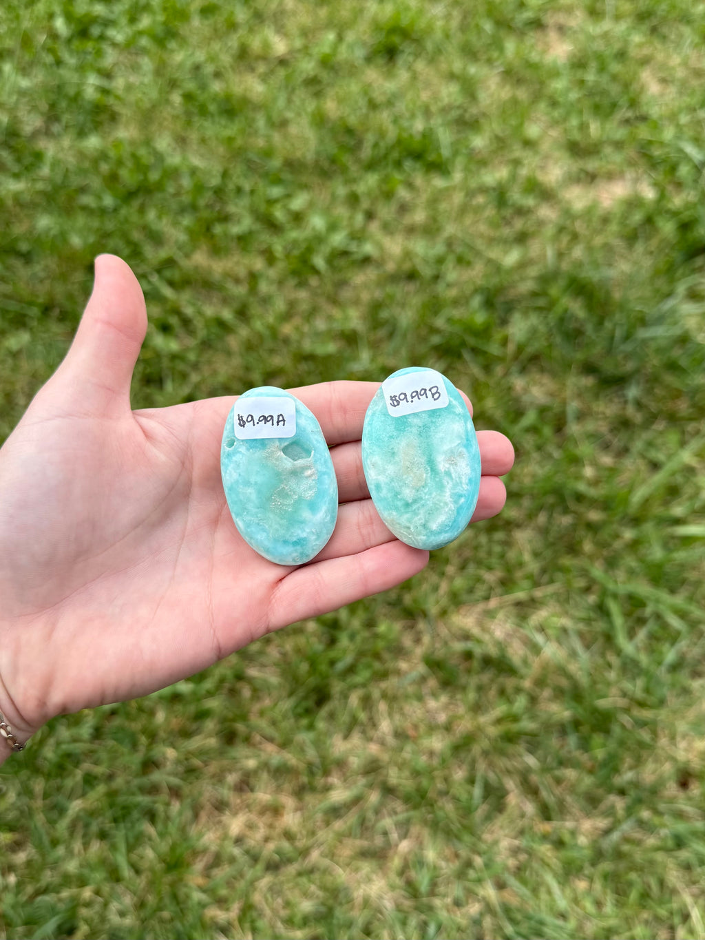 Small blue aragonite palm stones