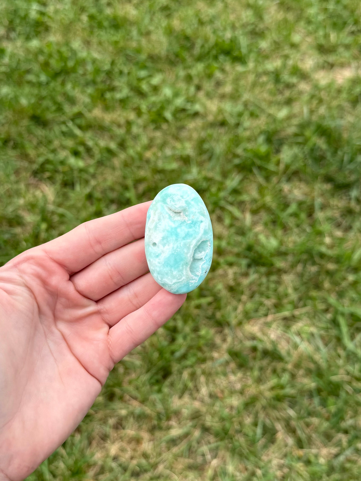 Small blue aragonite palm stones