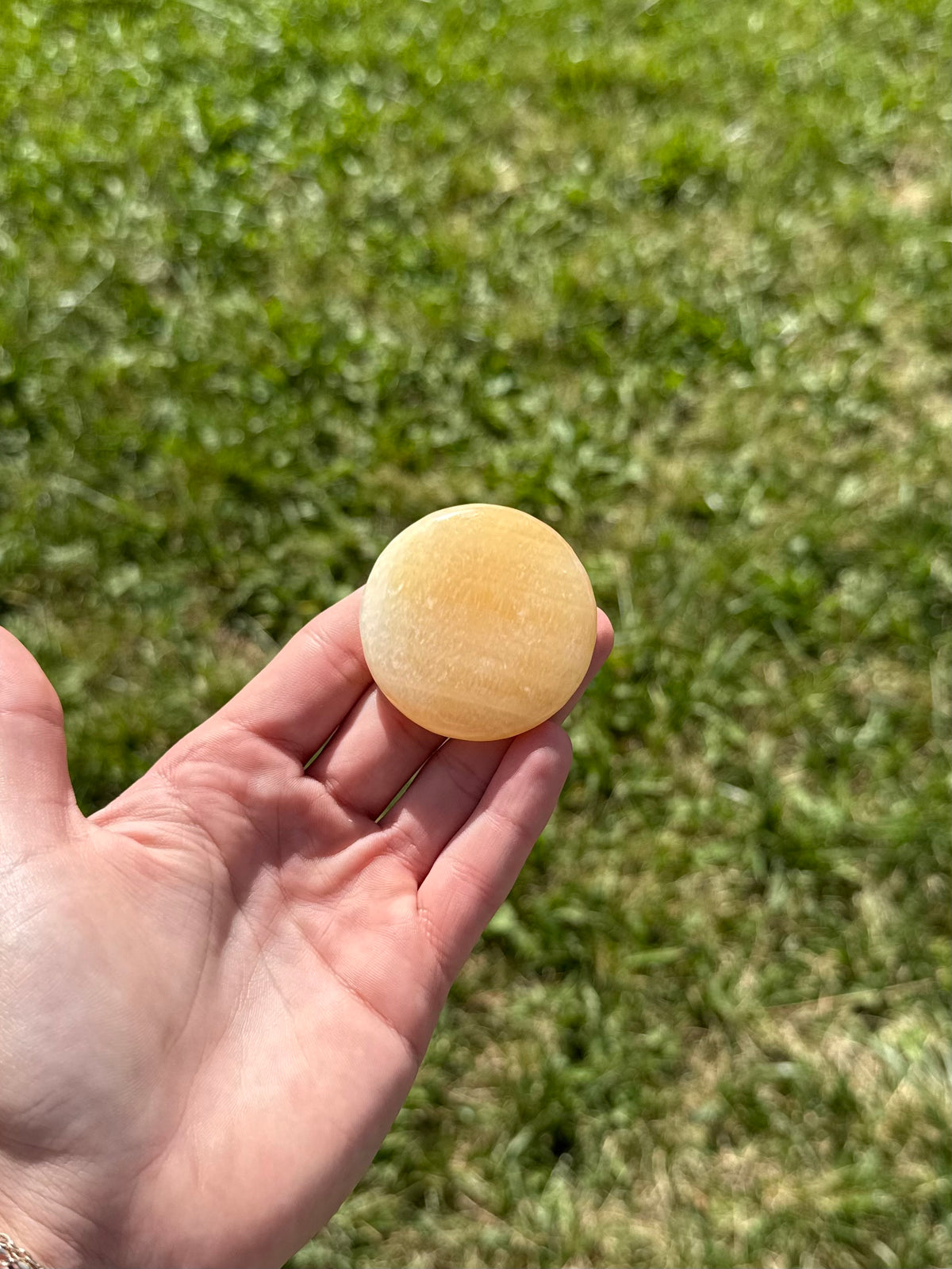 Large orange calcite round flats