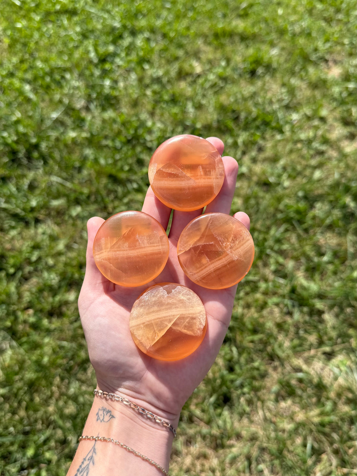 Large honey calcite round flats