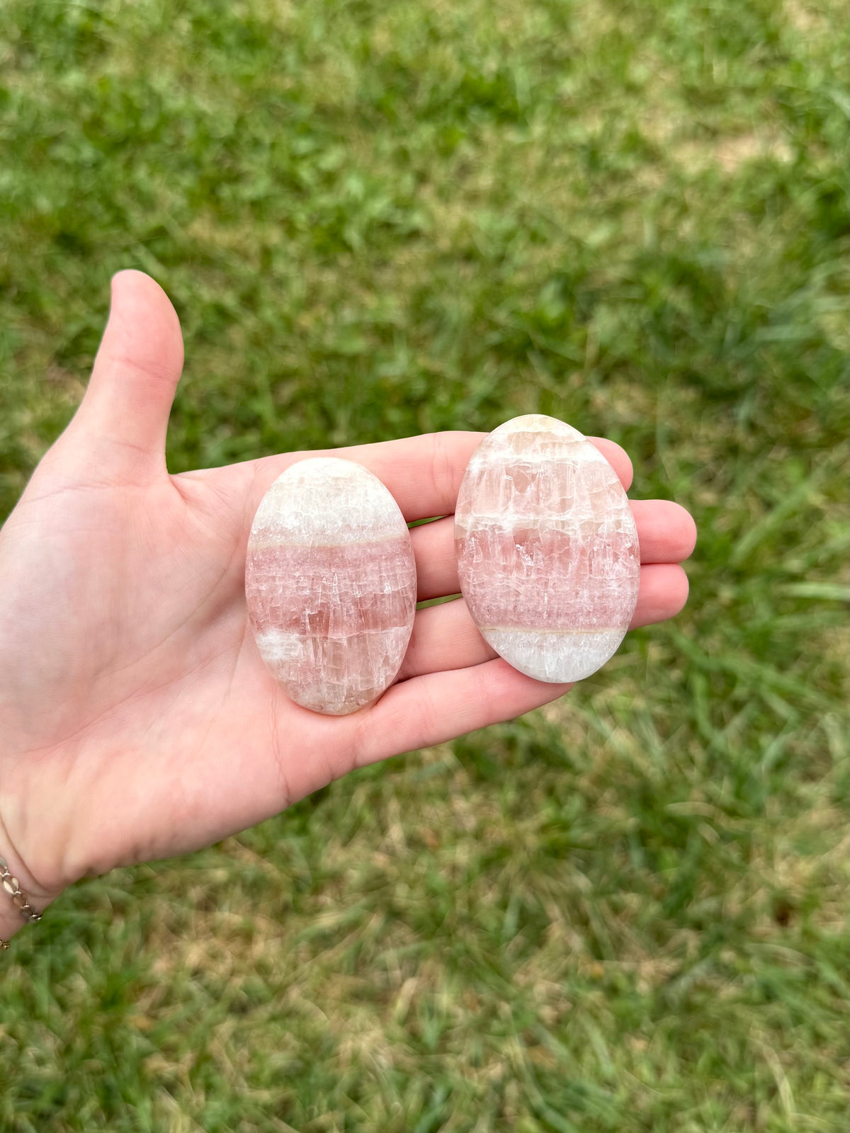 Medium rose calcite palm stones