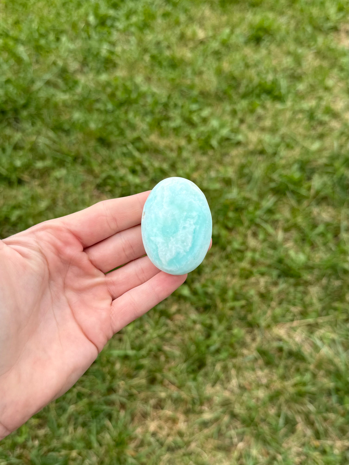 Medium blue aragonite palm stones