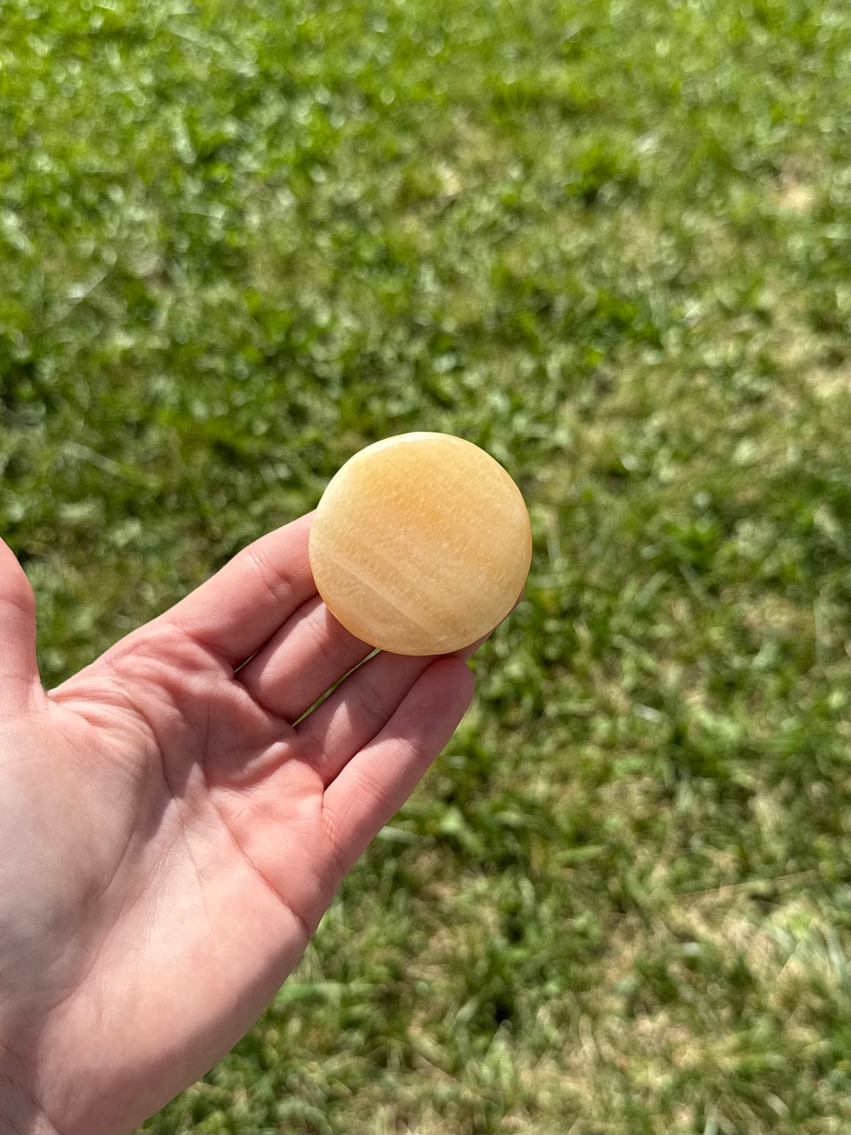 Large orange calcite round flats