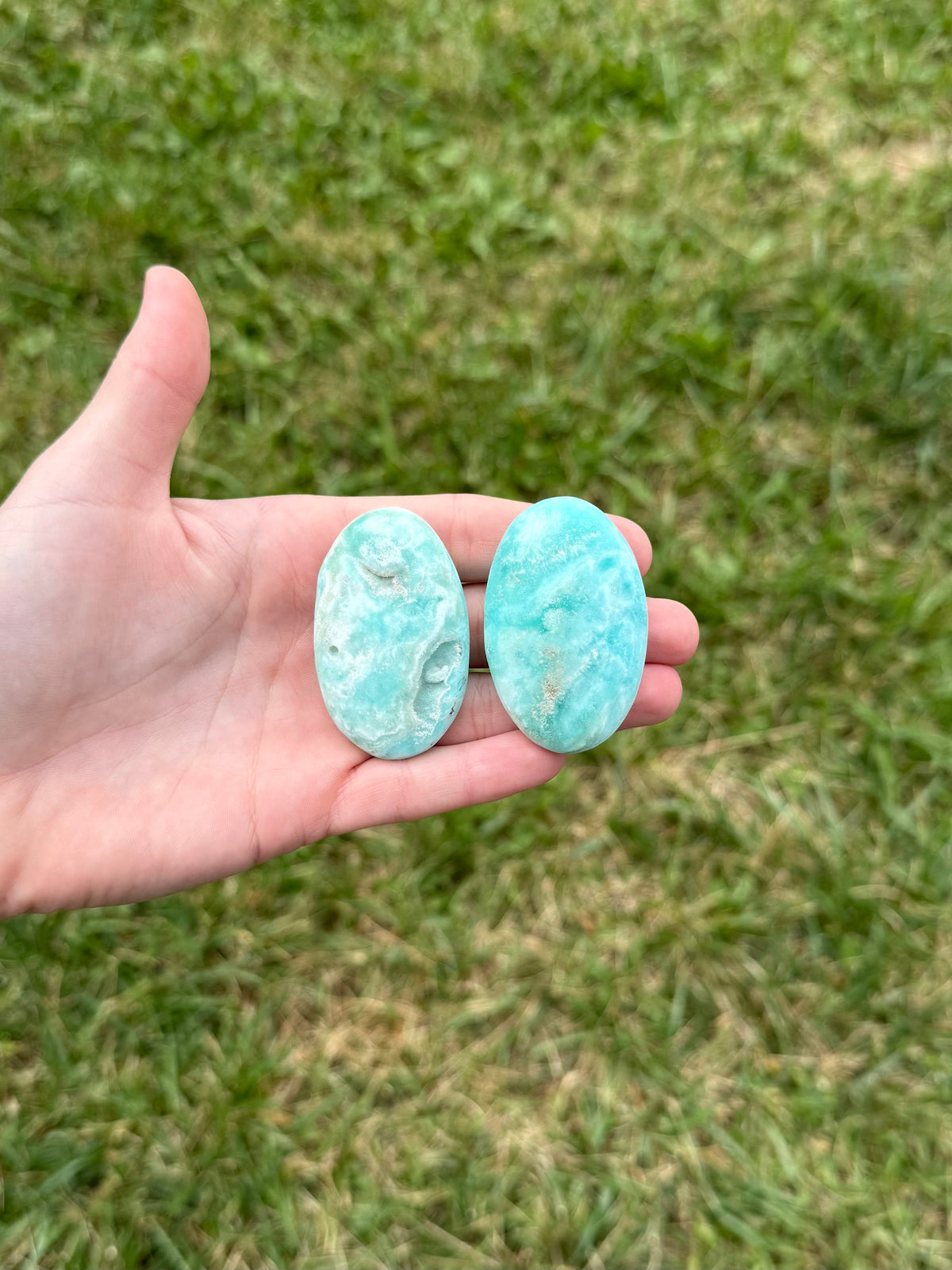 Small blue aragonite palm stones