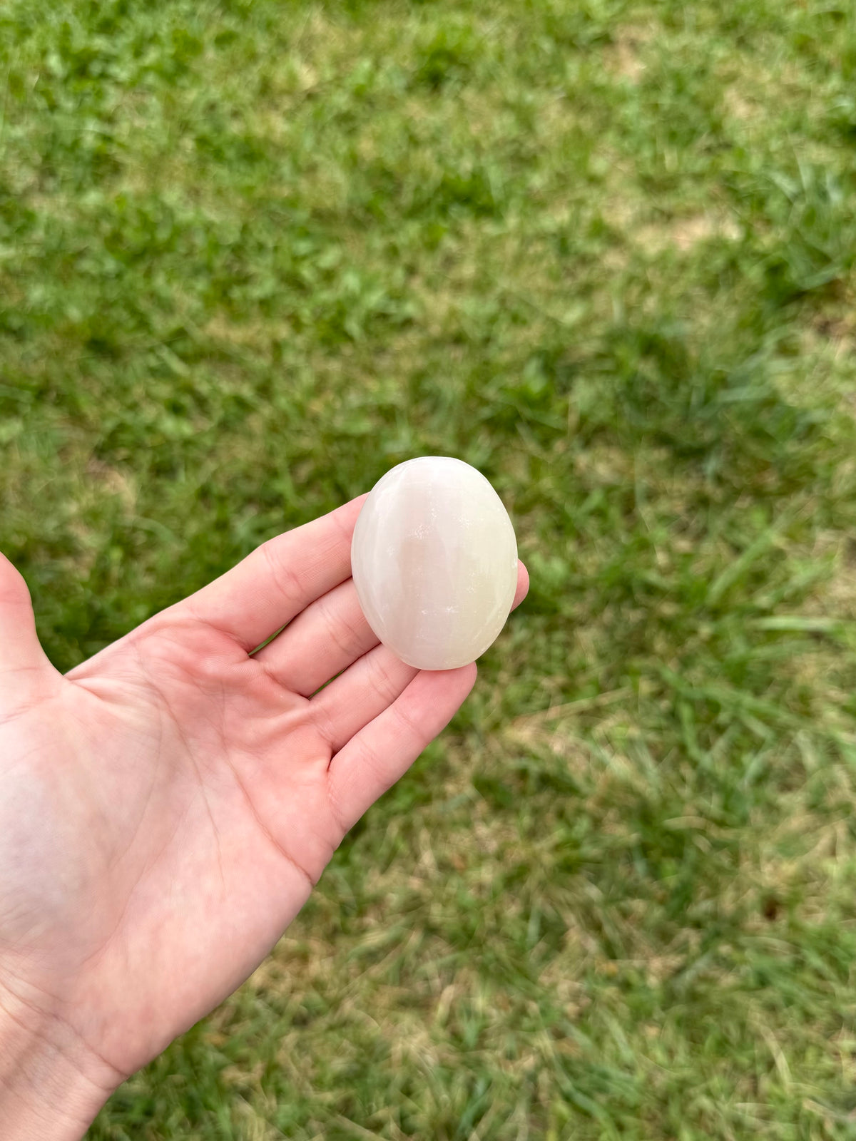 Medium pink banded onyx palm stones