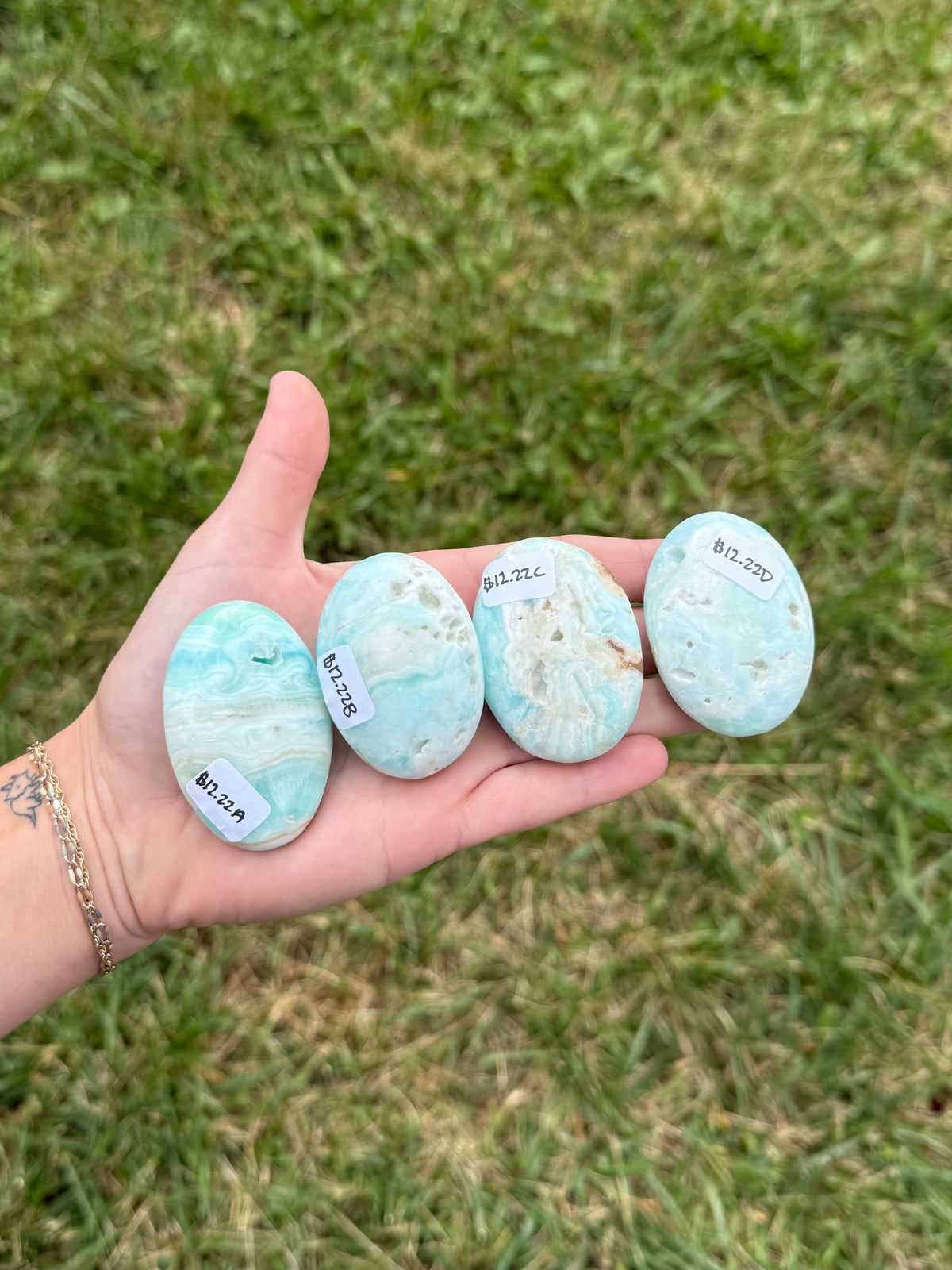 Medium blue aragonite palm stones