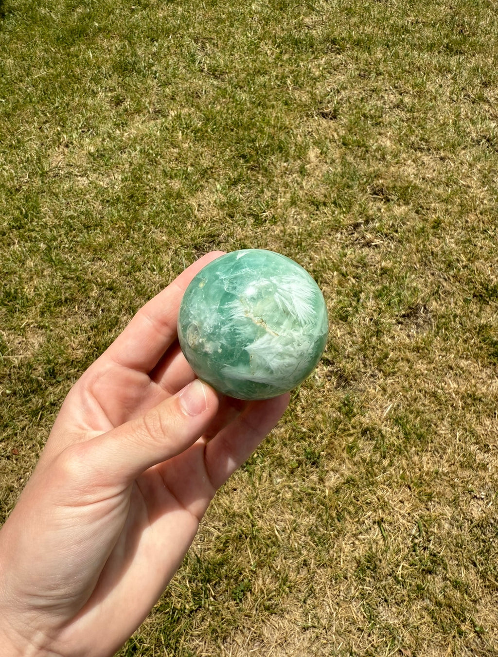 Misfit baja feather fluorite sphere