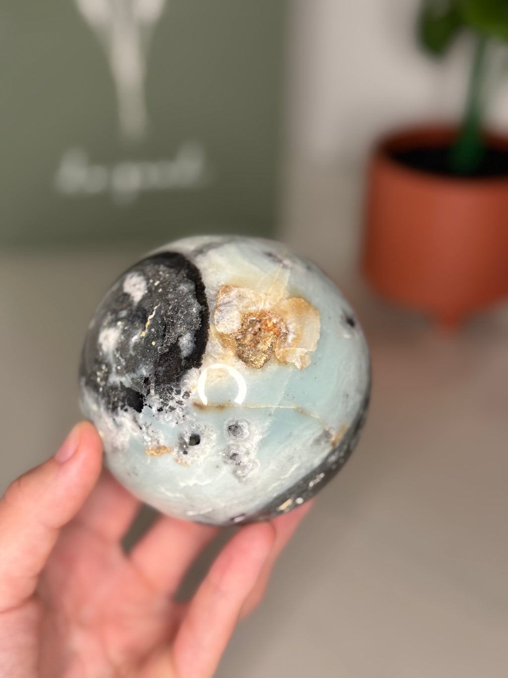Large Caribbean calcite with hematite sphere