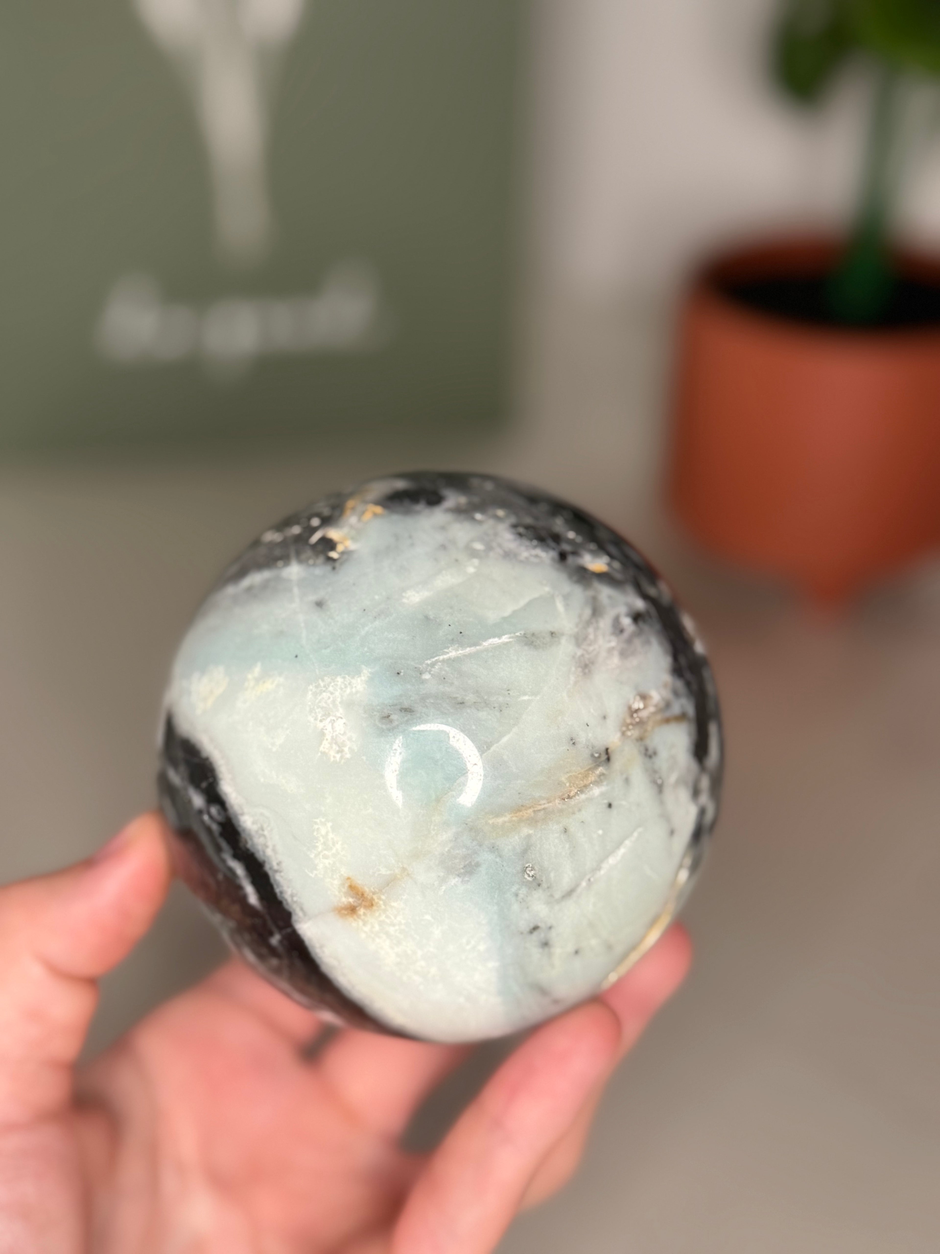 Large Caribbean calcite with hematite sphere