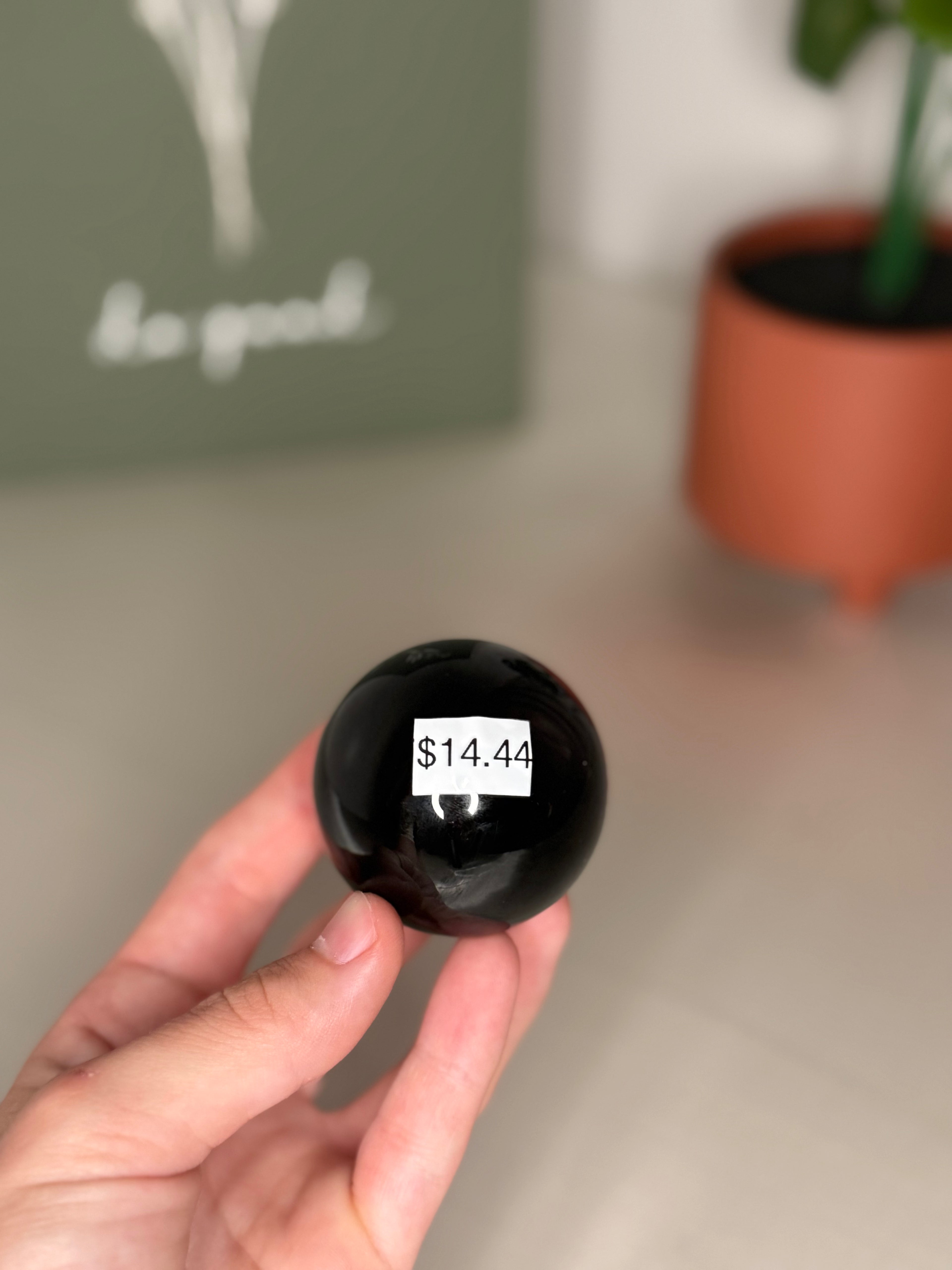 Engraved obsidian sphere