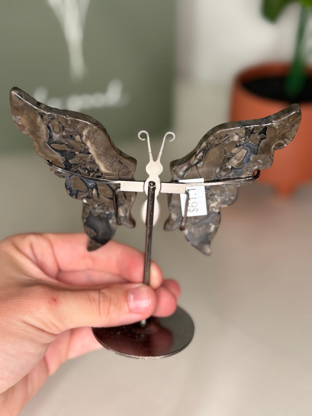 Volcano agate butterfly wings on a stand