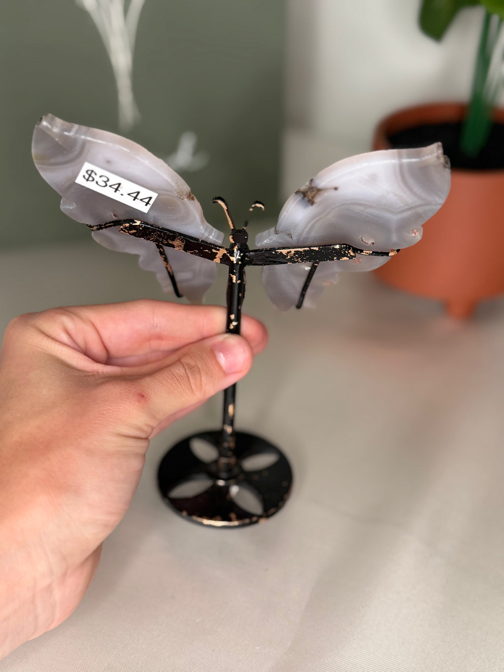 Imperfect agate butterfly wings on a stand
