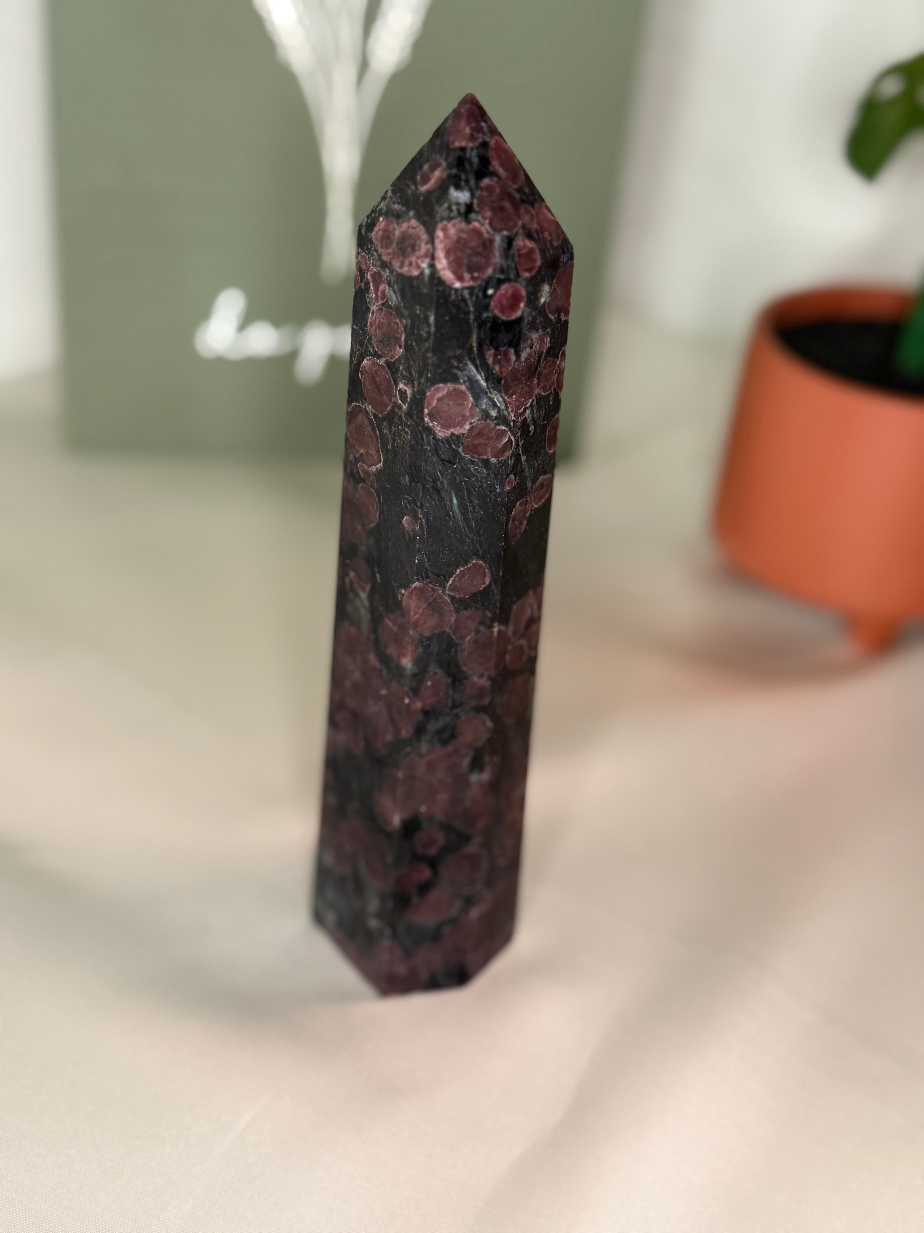 Large garnet with fireworks tower
