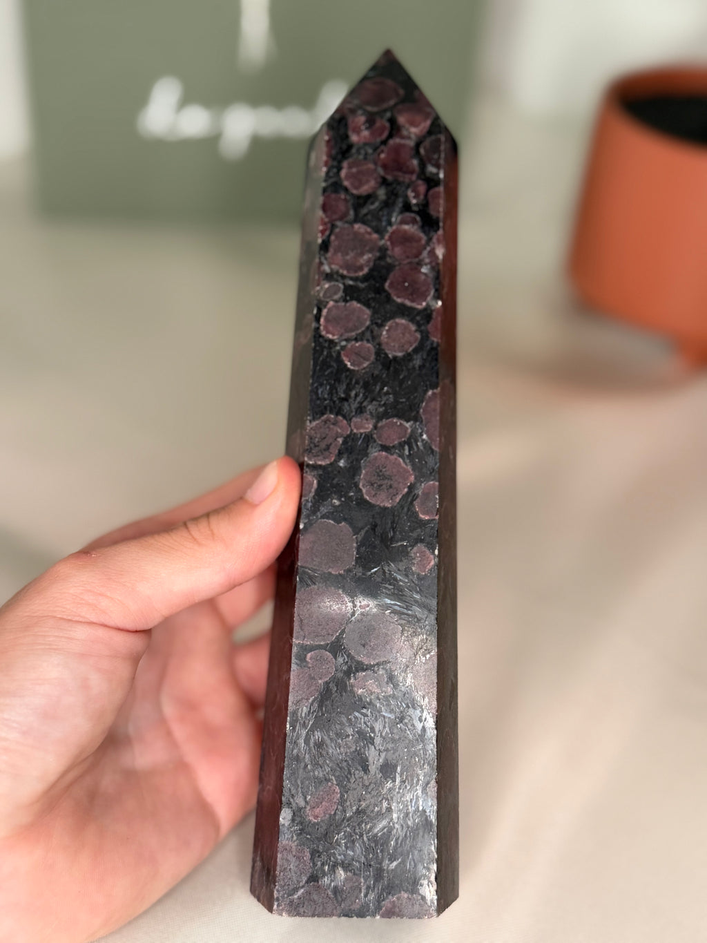 Large garnet with fireworks tower