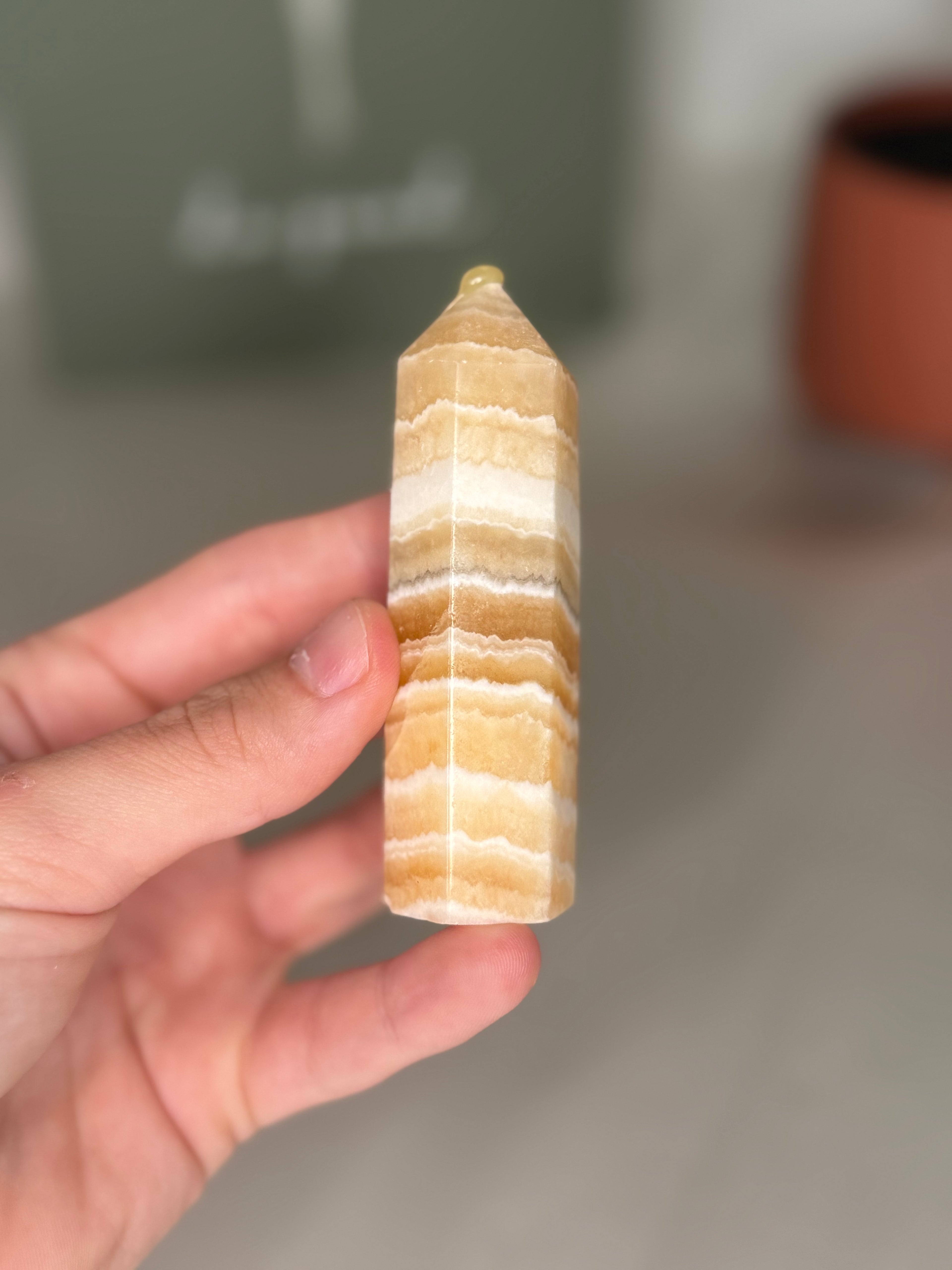 Banded orange calcite towers