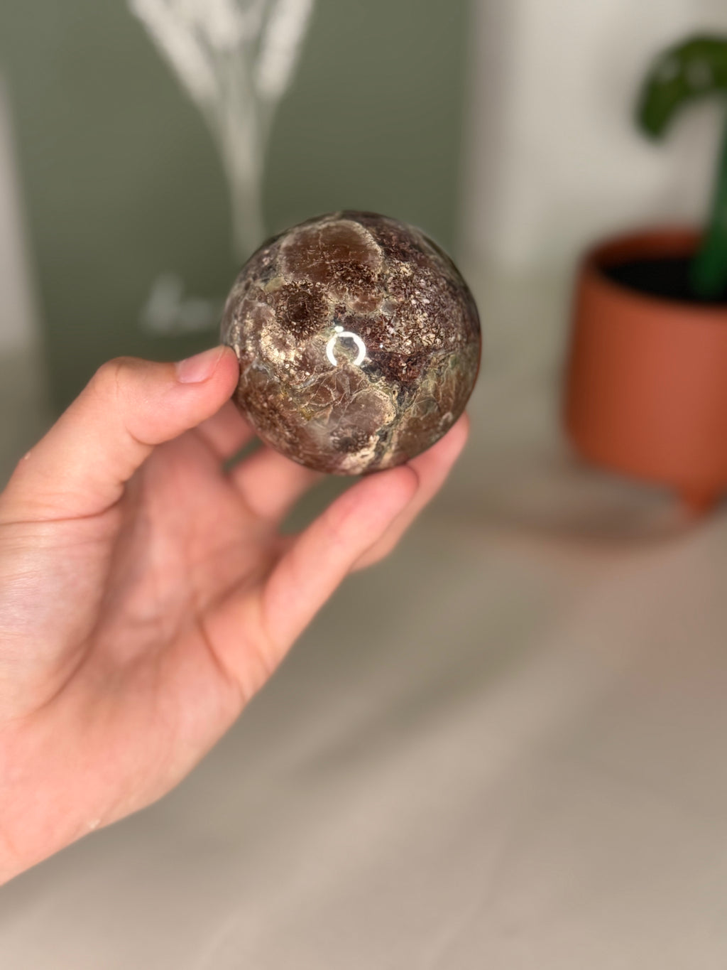 Plum jasper sphere
