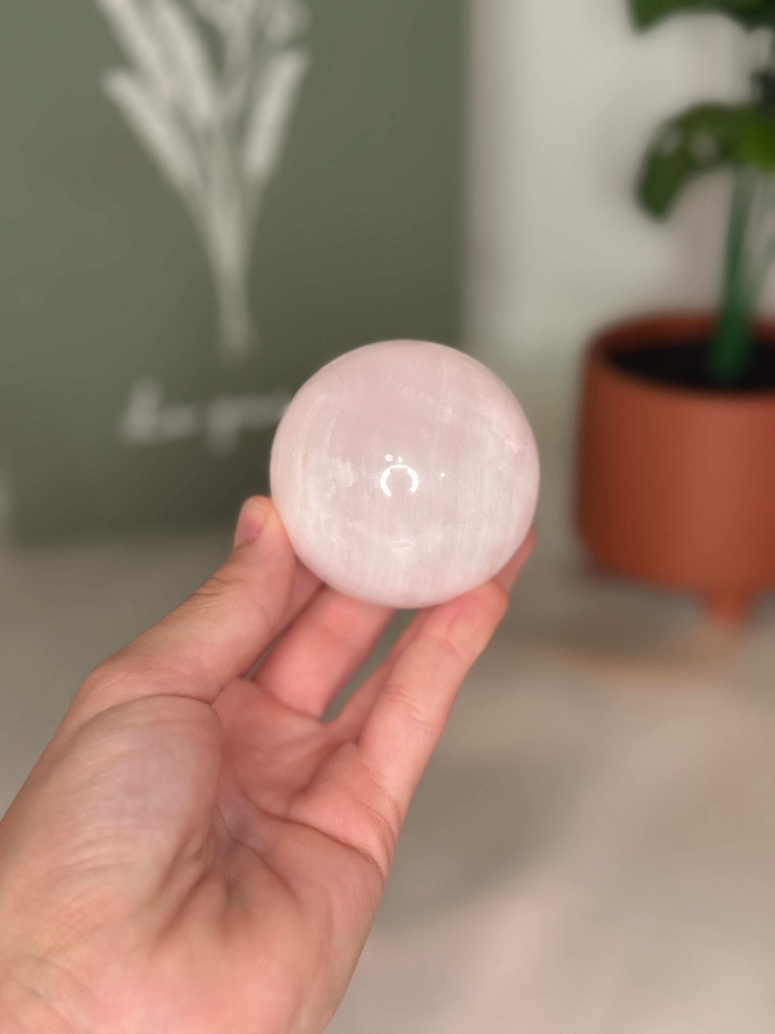 Pink calcite sphere (UV reactive)
