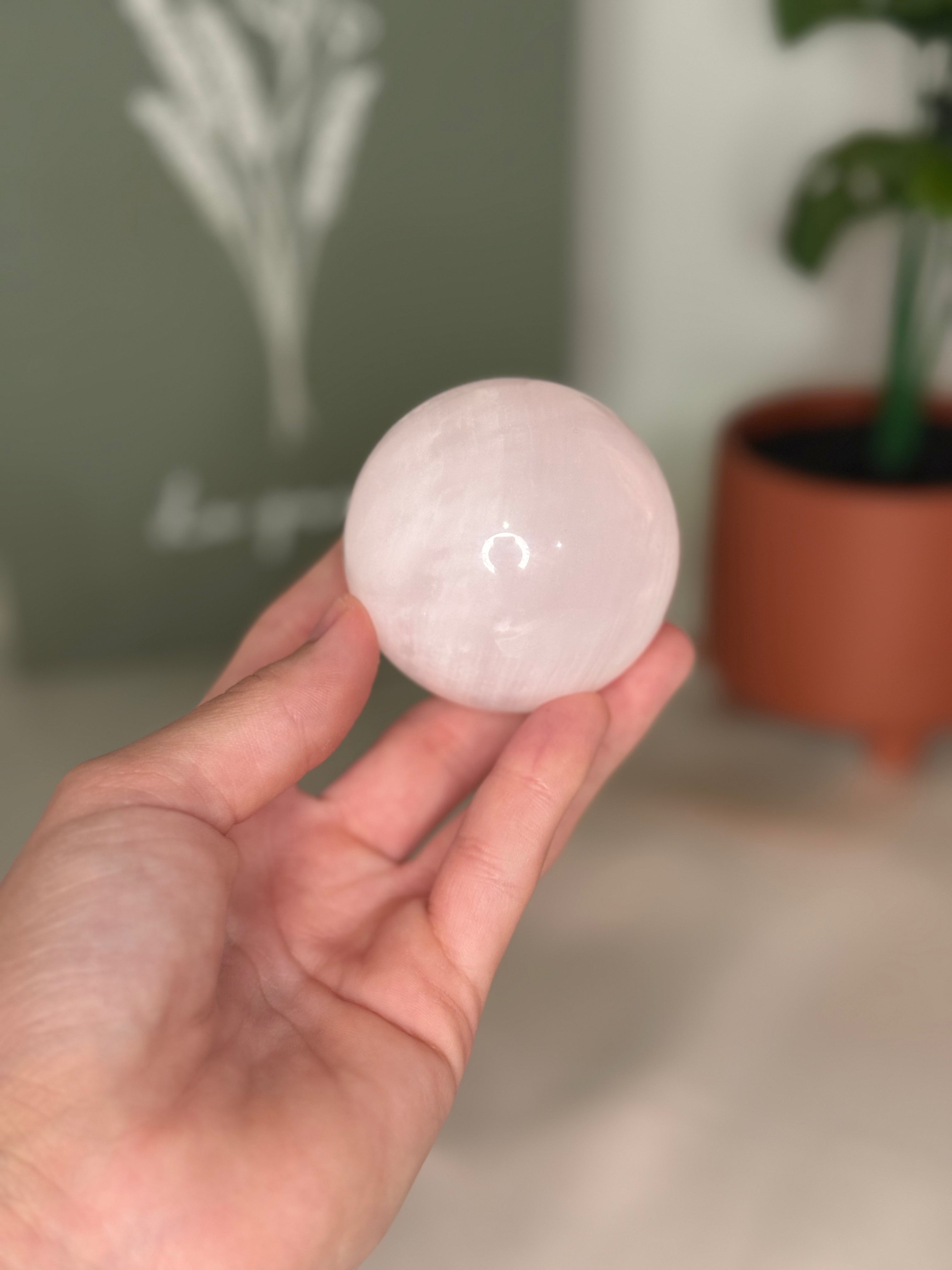 Pink calcite sphere (UV reactive)