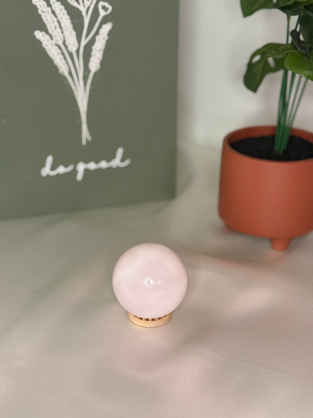Pink calcite sphere (UV reactive)