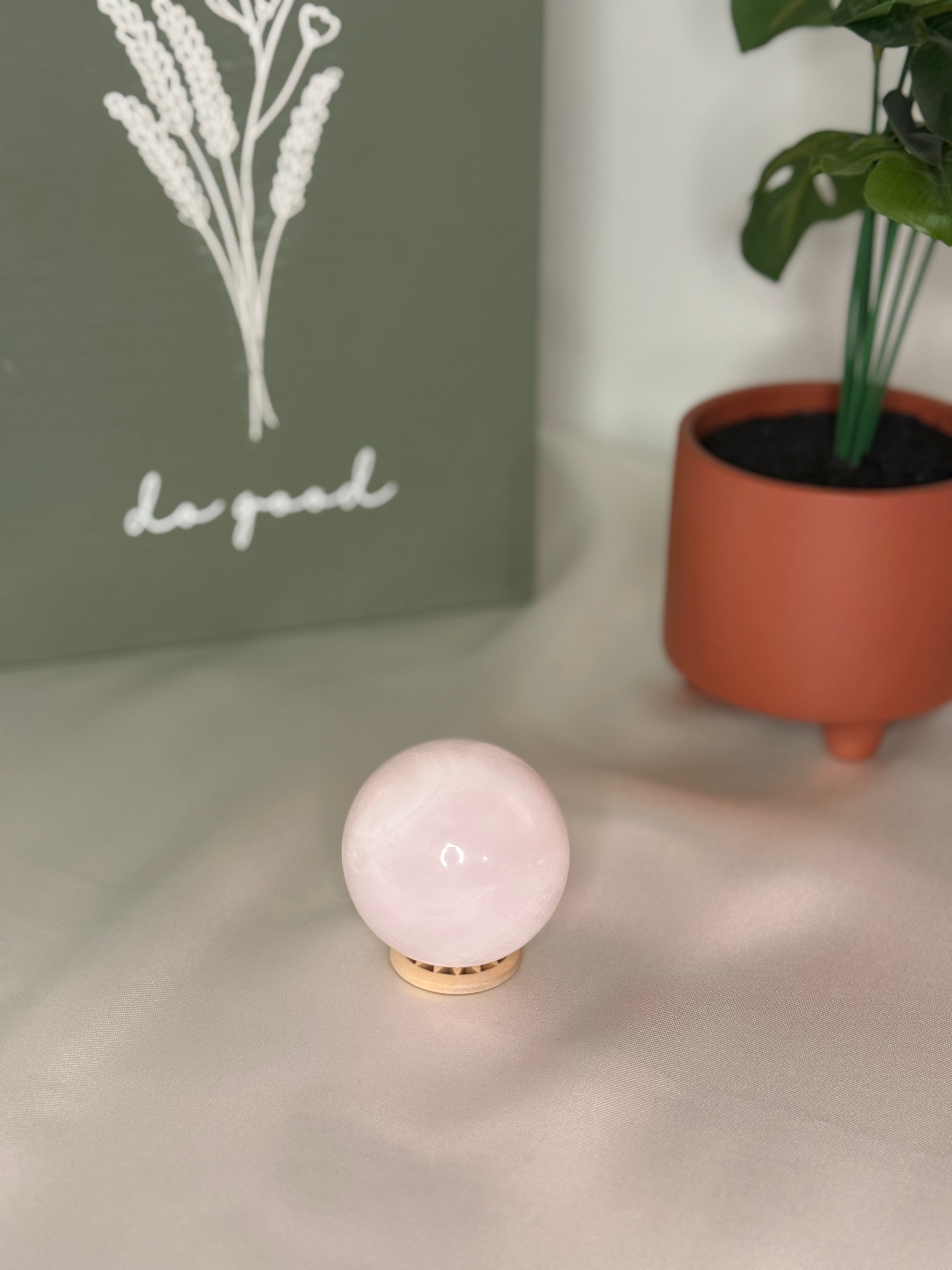 Pink calcite sphere (UV reactive)
