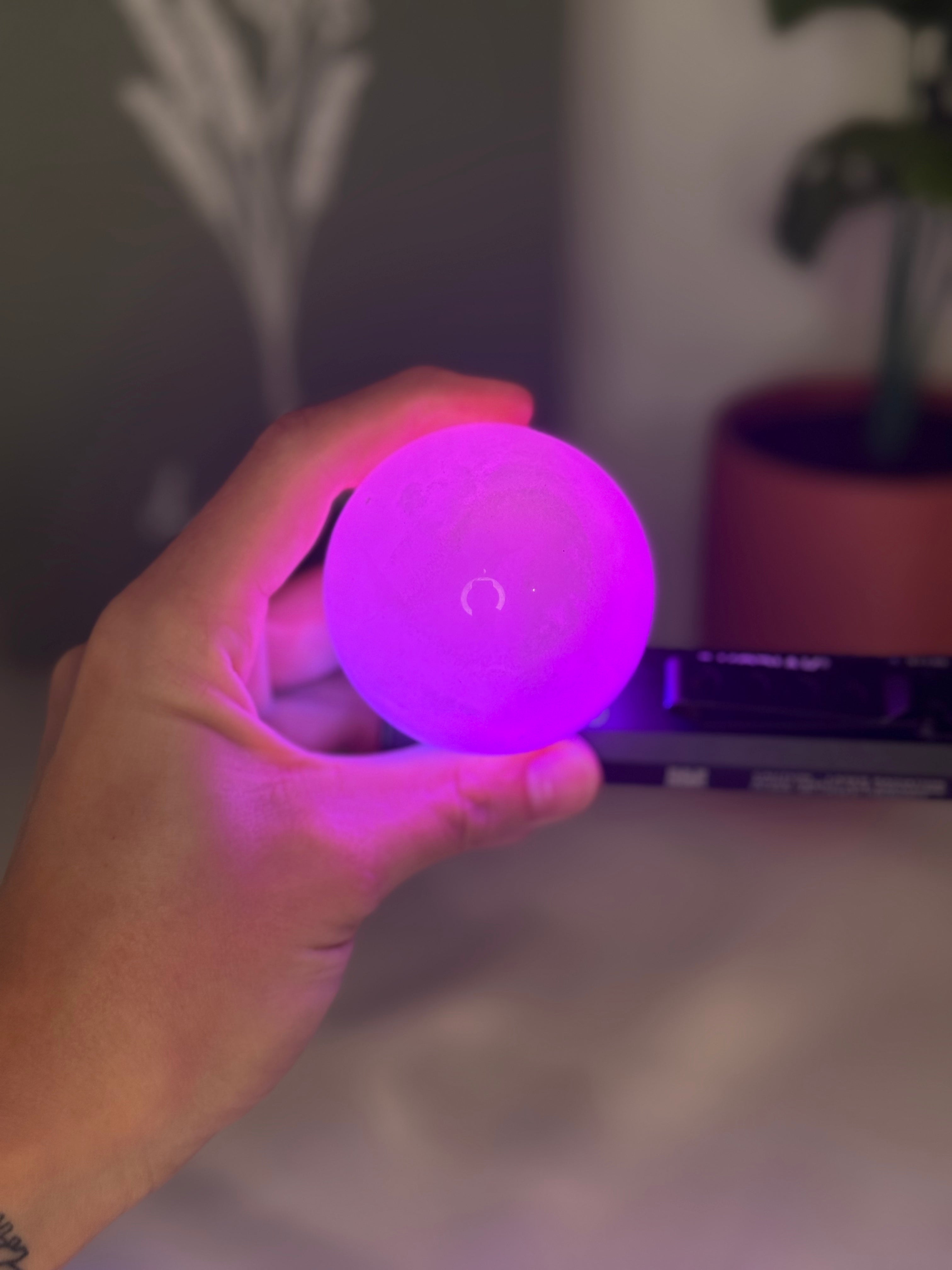 Pink calcite sphere (UV reactive)