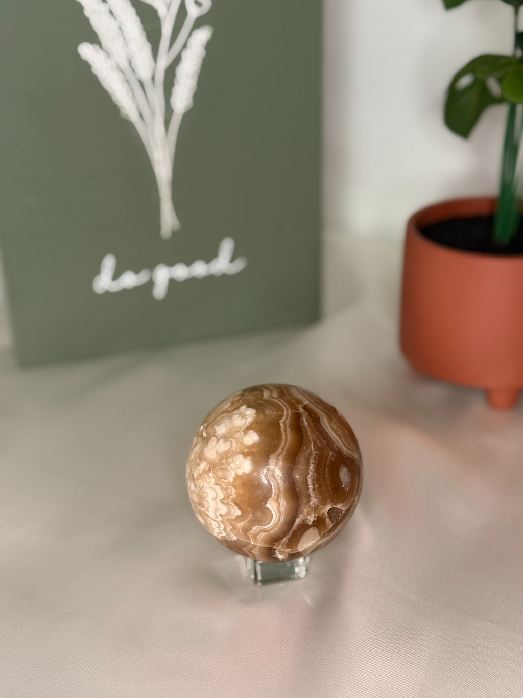 Amber calcite sphere (UV reactive)