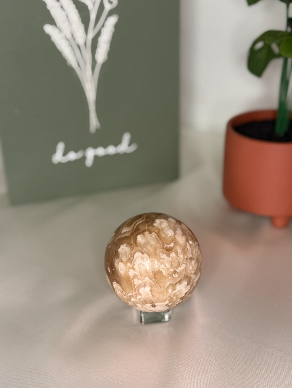 Amber calcite sphere (UV reactive)