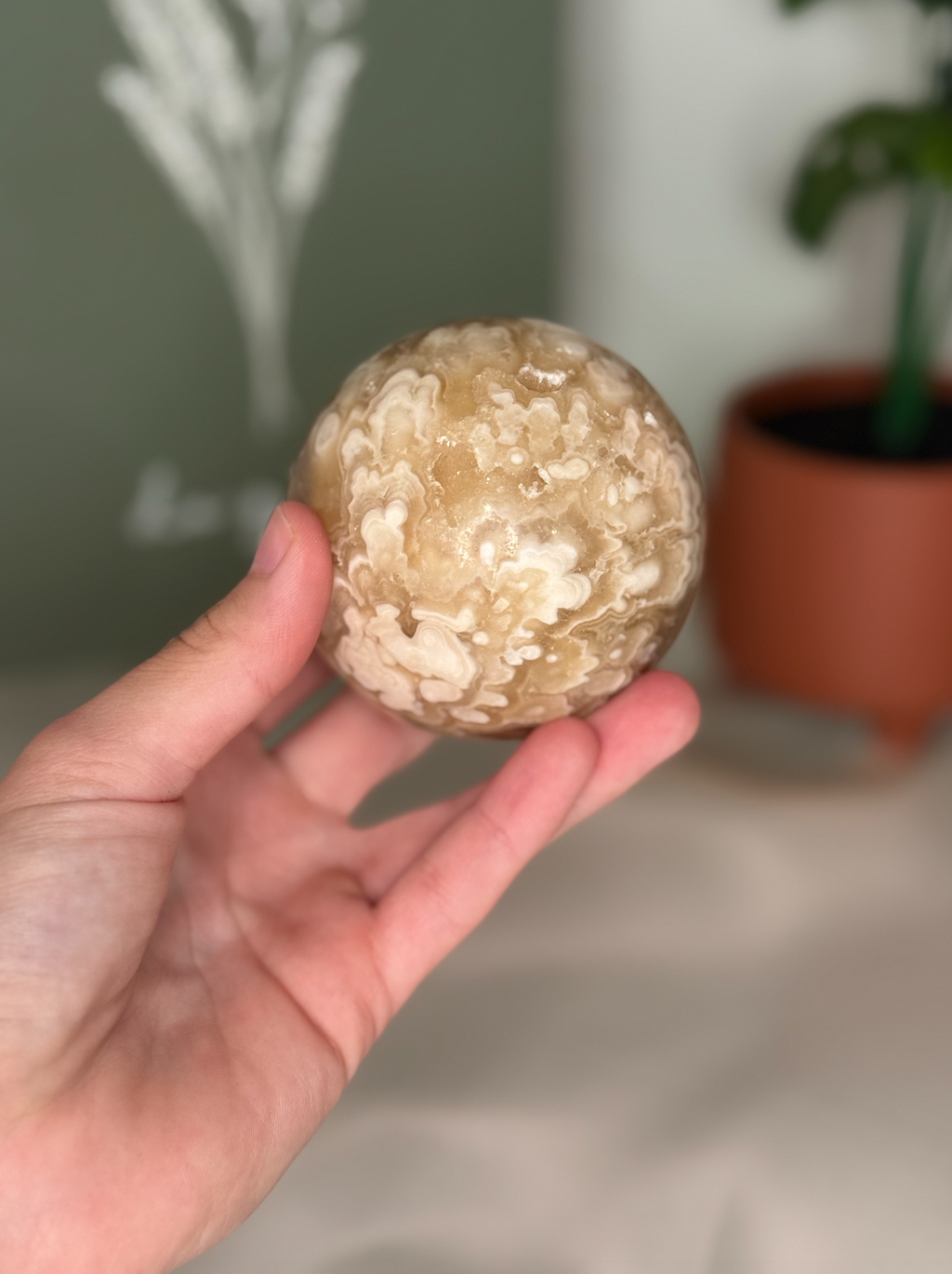 Amber calcite sphere (UV reactive)