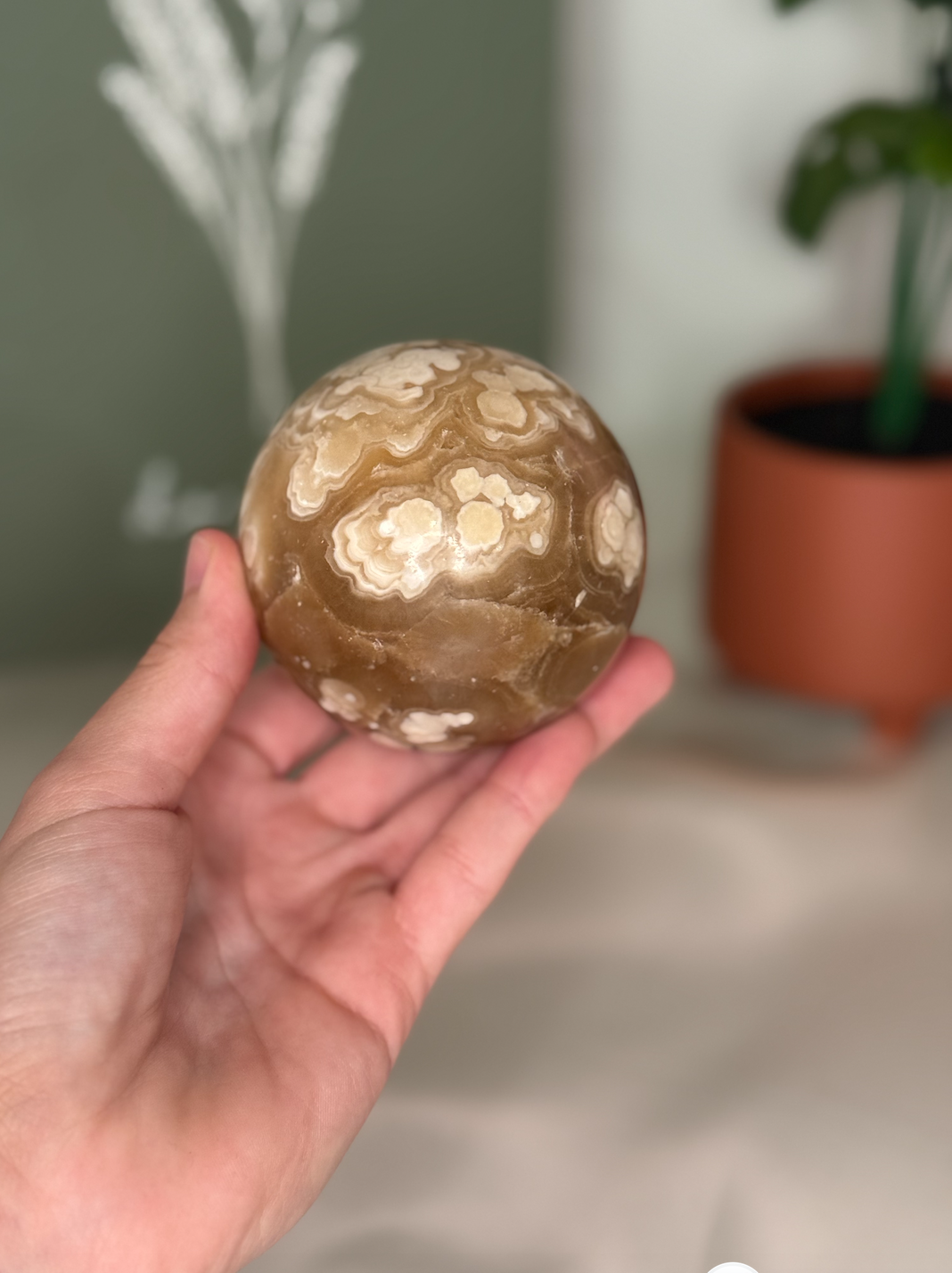 Amber calcite sphere (UV reactive)