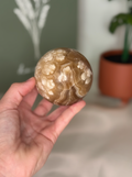 Amber calcite sphere (UV reactive)